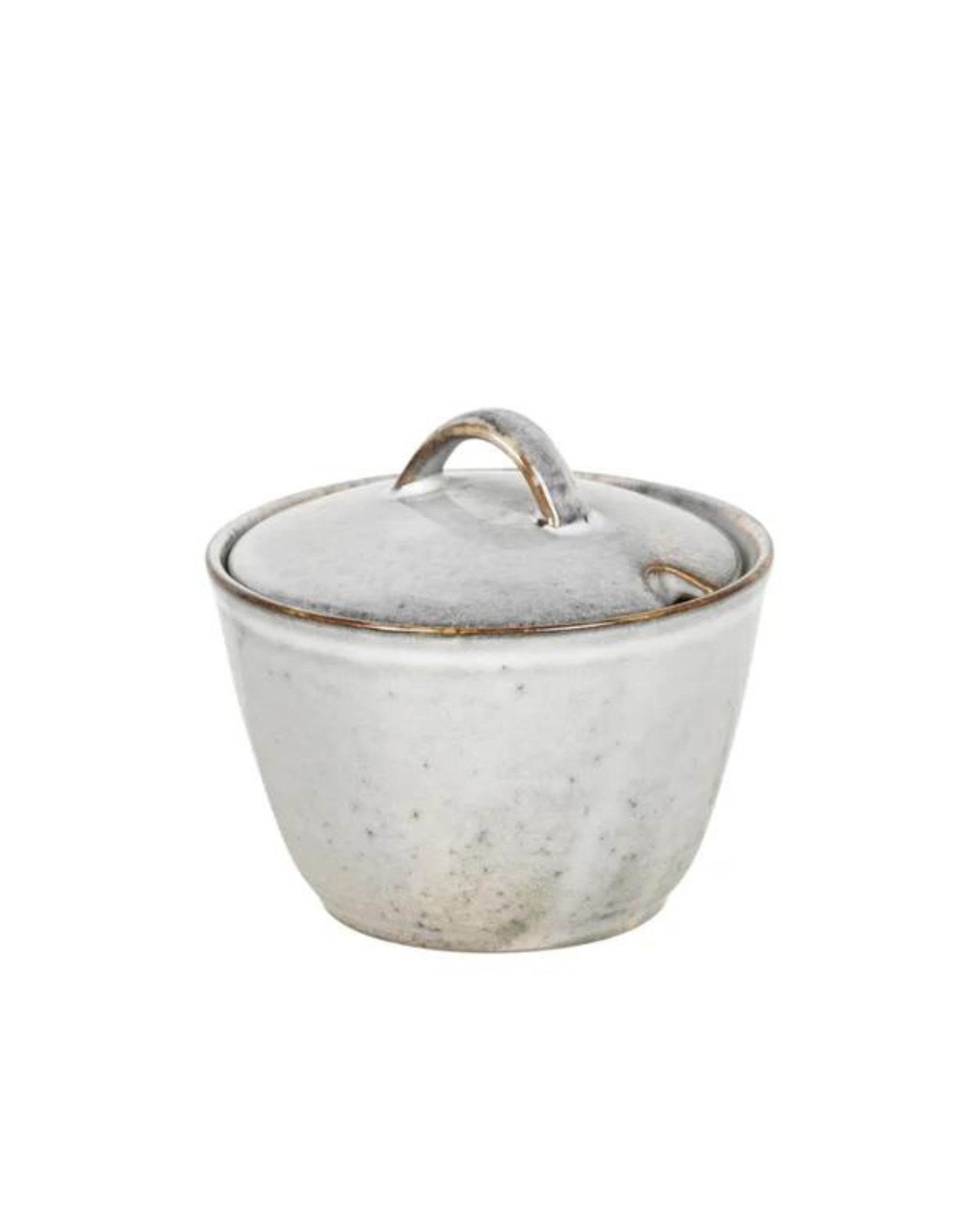 Introducing the SUGAR BOWL from Broste, this ceramic bowl features a matching lid with a charming curved handle. It showcases the Nordic Sand collection's rustic, speckled gray finish and slightly tapered shape, capturing Broste's signature coastal elegance.