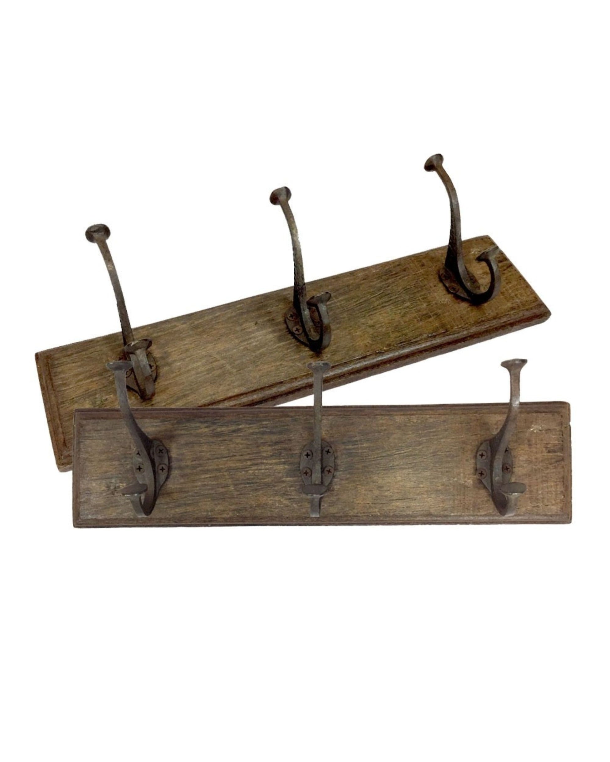 The SUFFOLK HOOK BOARD - THREE by Hawthorne is showcased against a white backdrop, featuring its vintage design with aged wood and three sturdy iron hooks on each of the two racks. Perfect for practical use or to add an antique touch, these boards highlight a charming rustic appeal.