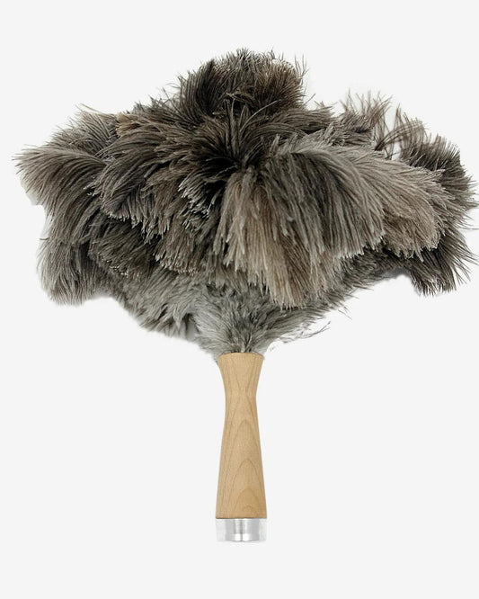 An Andree Jardin Small Handled Feather Duster with ostrich feathers, characterized by its fluffy gray plume, wooden handle, and metal cap, is elegantly set against a plain white background.