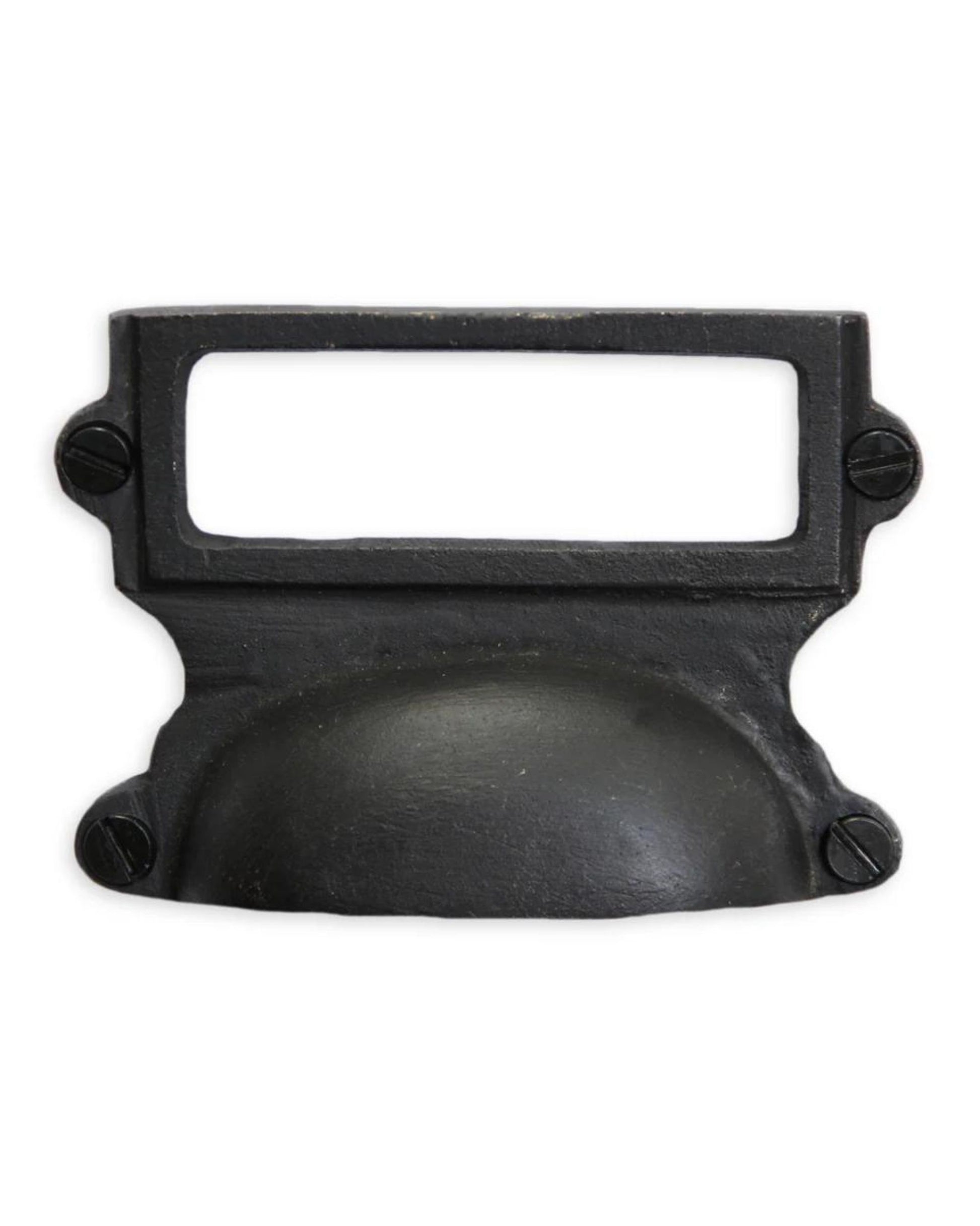 The MAJOR DRAWER PULL BLACK by Society Ink is a vintage-style metal drawer handle in black, designed with a rectangular label holder on top and equipped with two screws on each side for secure attachment. Ideal for an oak piece with many drawers, its bottom part elegantly curves for easy pulling.