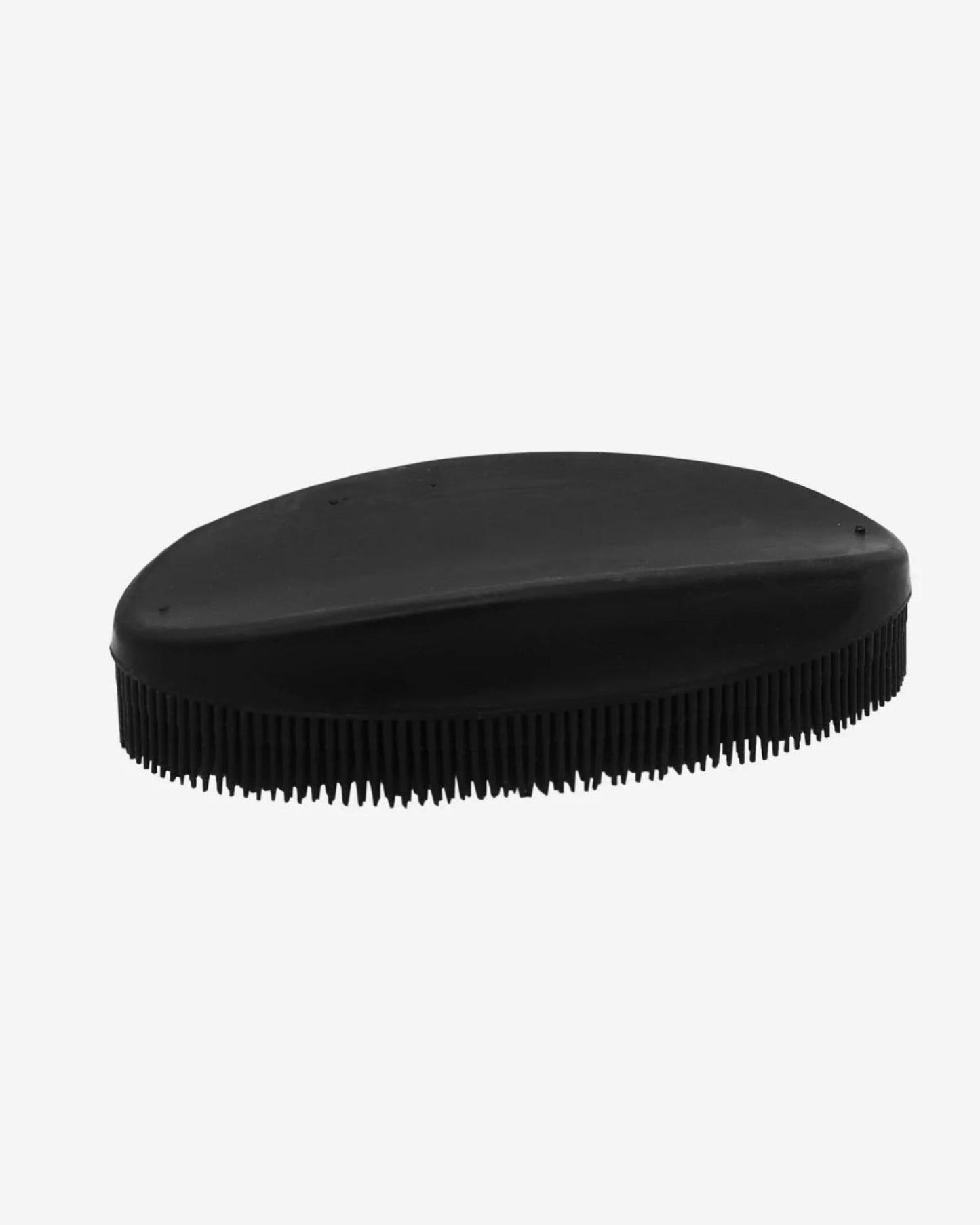 An Andree Jardin BLACK RUBBER TEXTILE BRUSH, designed in an oval shape and made from natural rubber with short, flexible bristles, is showcased against a white background. Ideal for effortlessly removing lint.