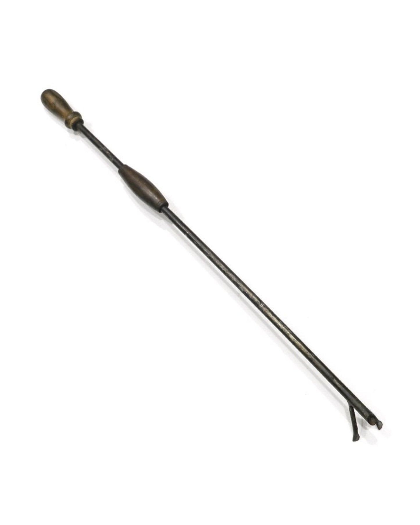 The SAHAR FIRE POKER by Hawthorne is an antique iron tool with a handcrafted wooden handle and a long, slender rod featuring a forked end, crafted from reclaimed iron, traditionally used for managing hot coals or adjusting firewood.
