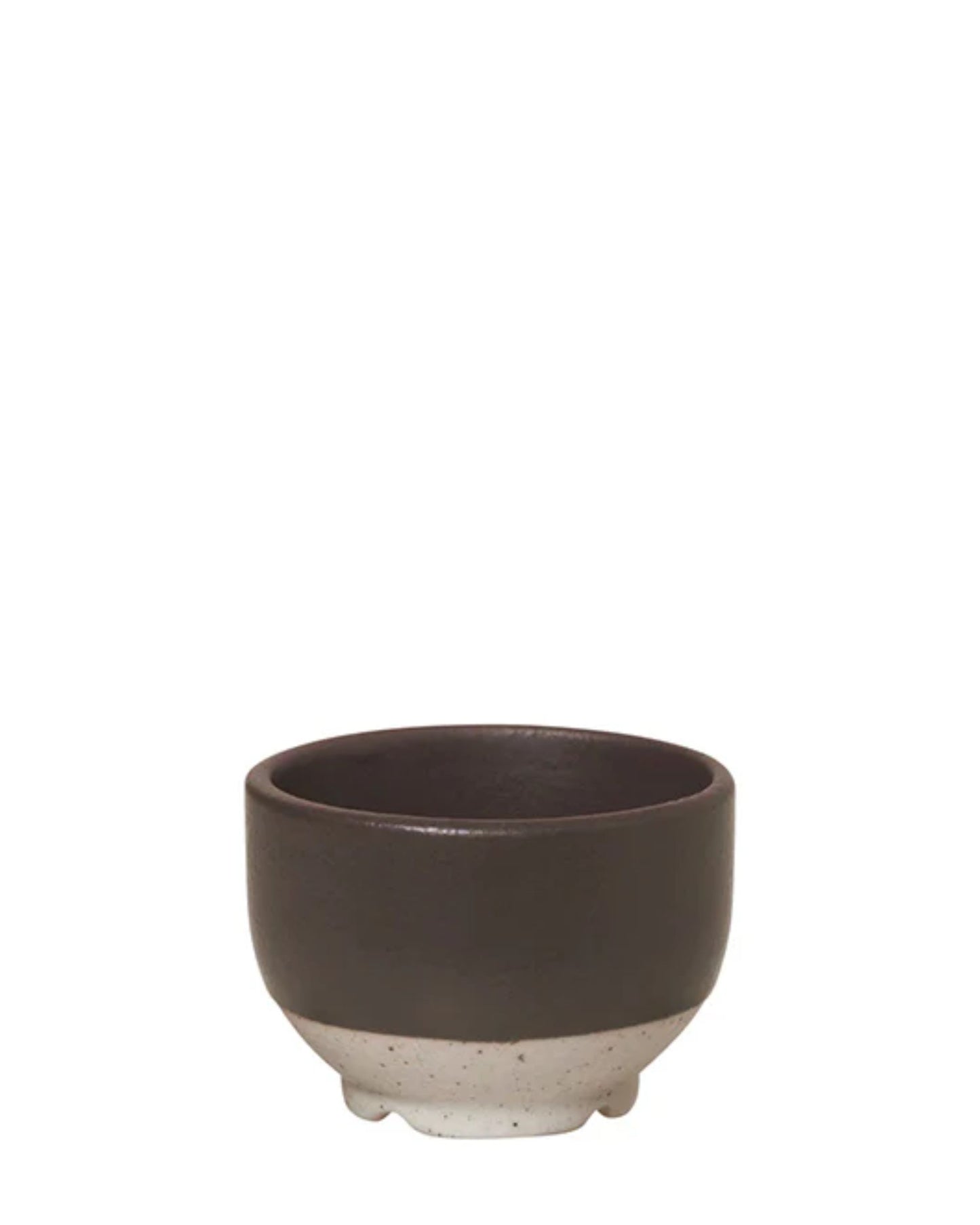 The ELI MINI BOWL by Broste exemplifies the elegance of Japanese tableware with its small, round design featuring a matte black top half and a speckled white bottom half.