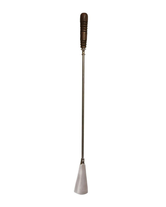 Introducing the LONG SHOE HORN by CC Interiors, featuring a brown wooden handle with an ergonomic grip for comfort, a slender shaft, and a wide, flattened tip at the end.