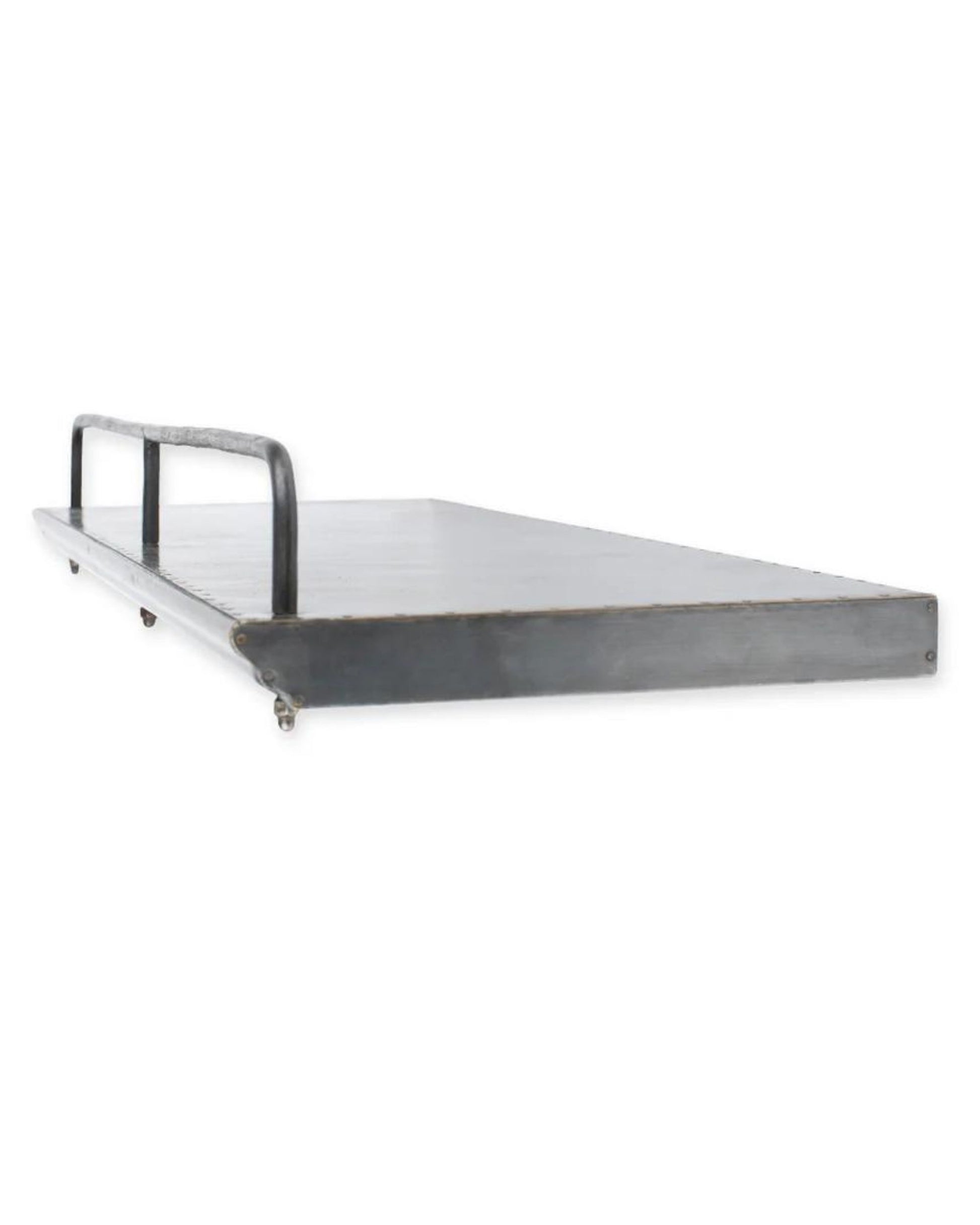 Introducing the Society Ink PALMER ZINC SHELF bed: a sleek, rectangular metal platform bed that boasts a low-profile design and a minimalist headboard. It features clean lines and a metallic finish inspired by the PALMER ZINC SHELF, with small wheels underneath for easy mobility.
