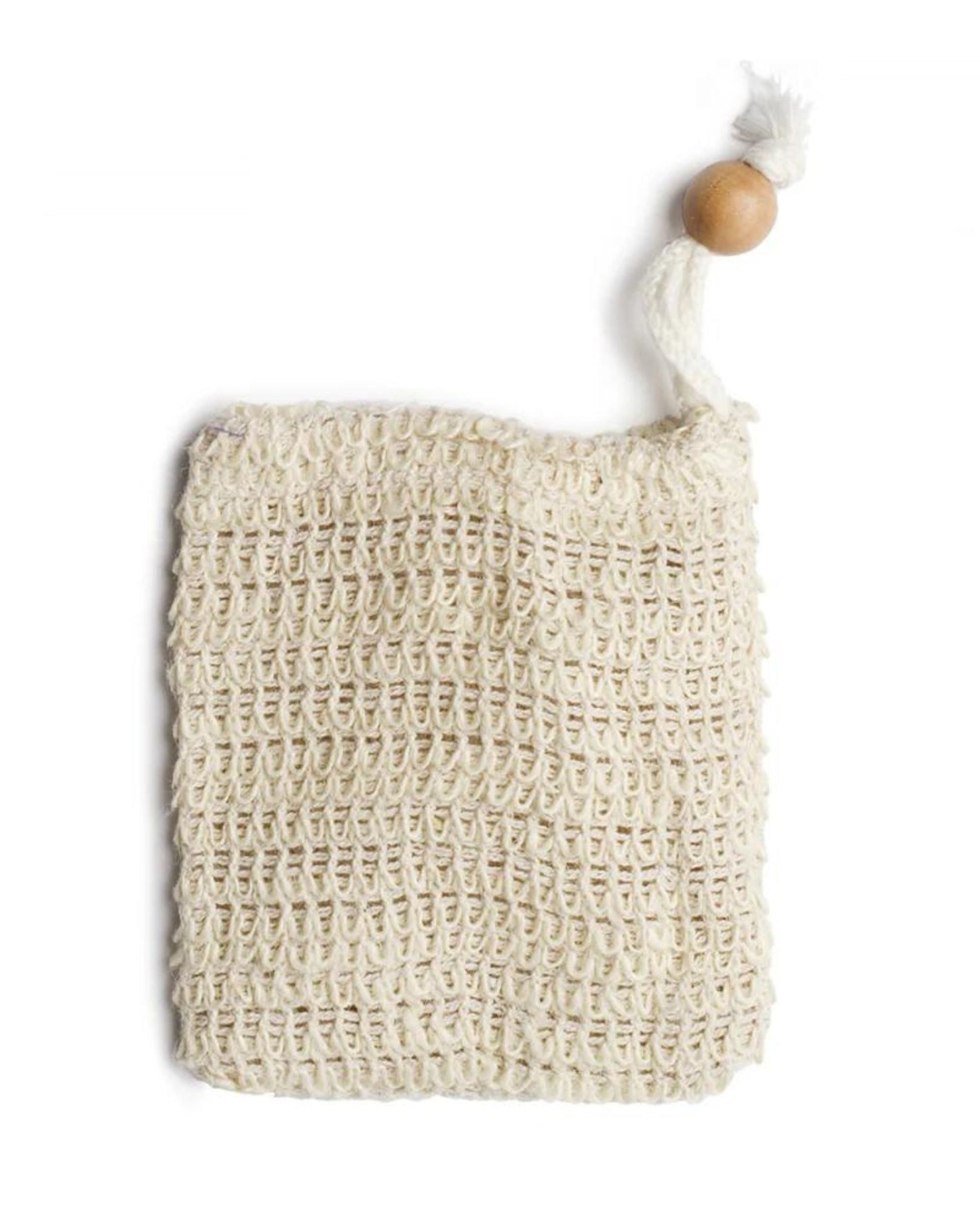 The EXFOLIATING SOAP SACK by Redecker, featuring a beige knitted design with a wooden bead and white rope tied at the top corner, lies against a plain white background.