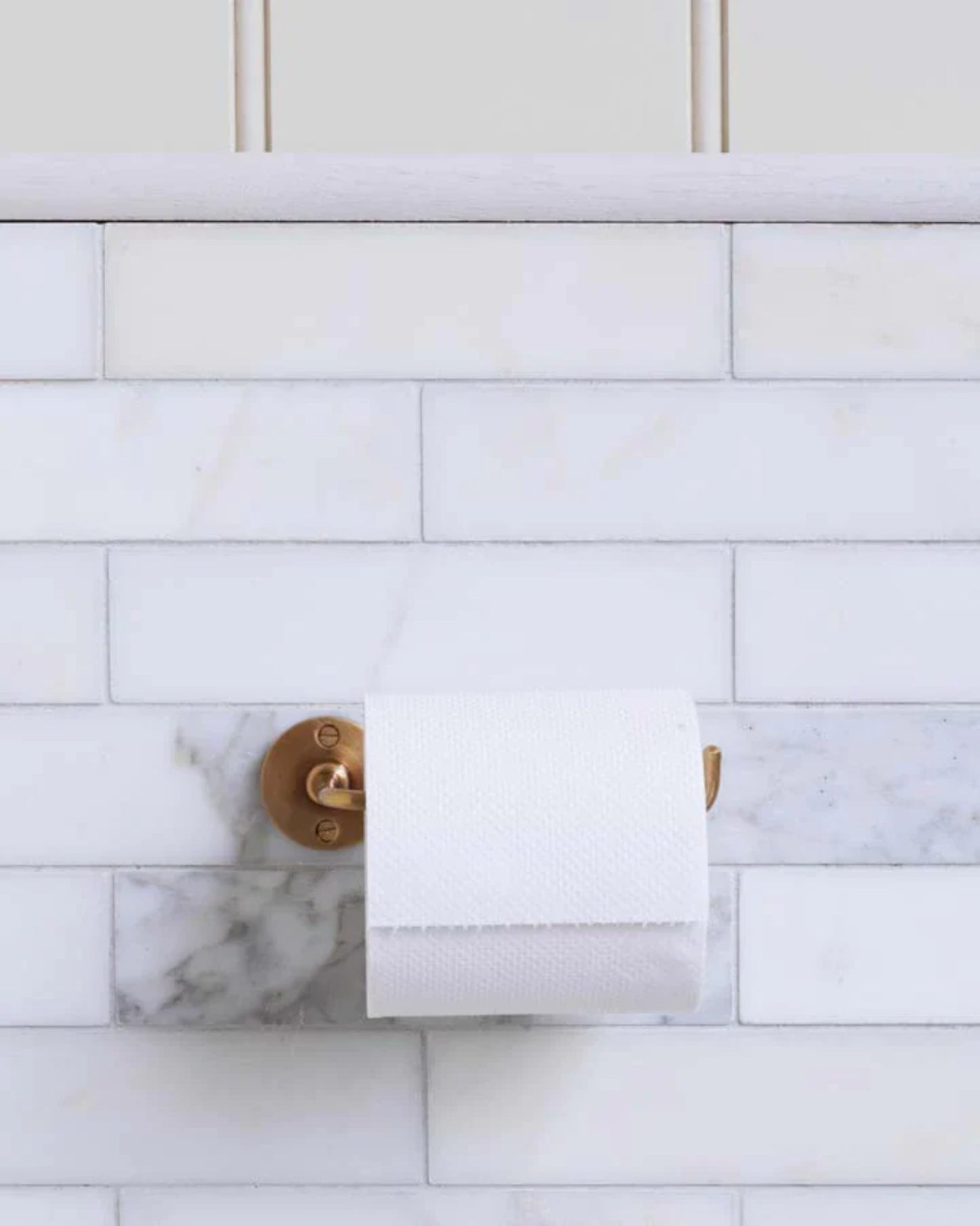 STOWAWAY TOILET PAPER HOLDER