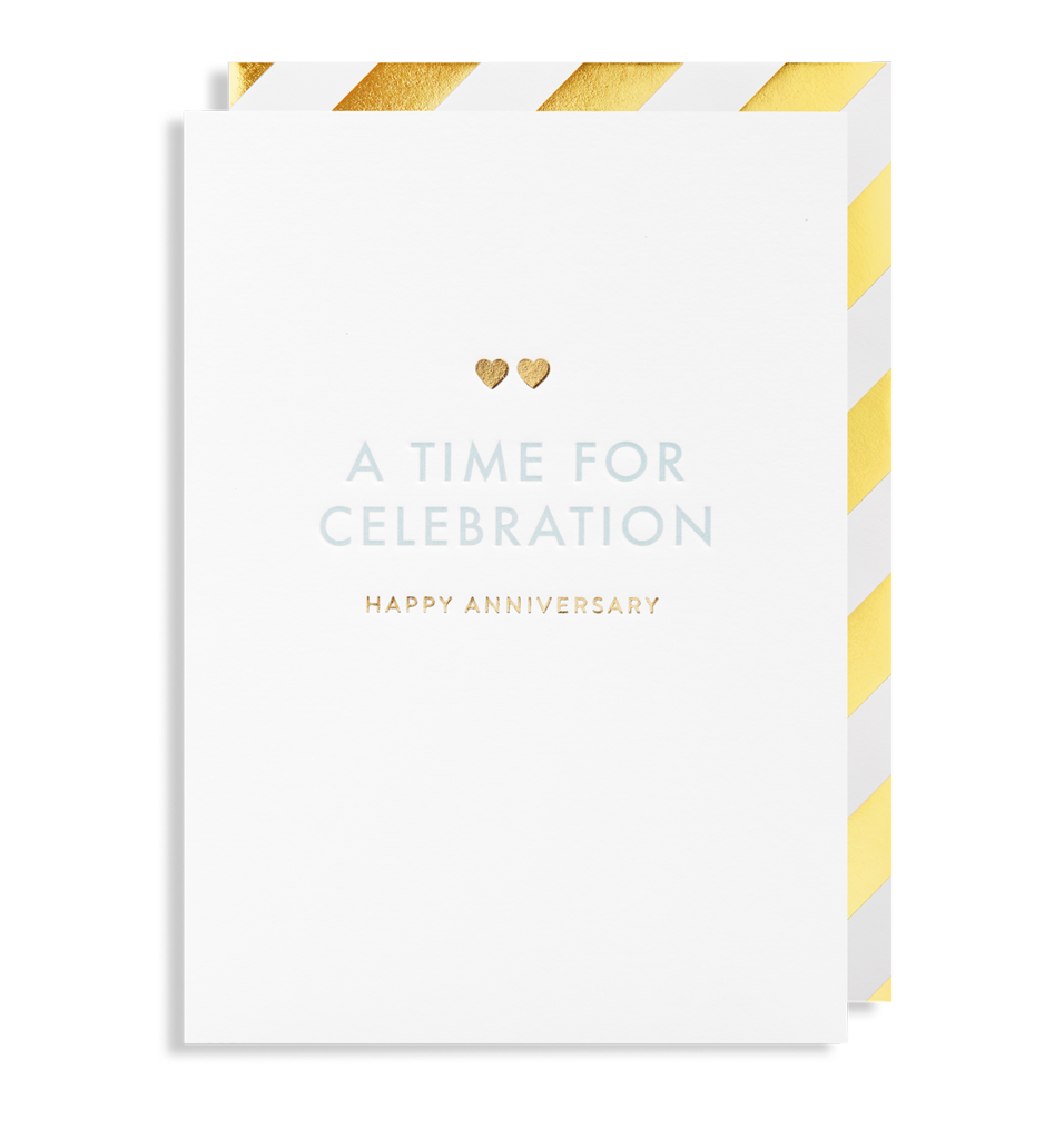 Introducing the Oxted "A TIME FOR CELEBRATION - GREETING CARD," featuring elegant gold and white diagonal stripes inside. The cover highlights the phrase "A TIME FOR CELEBRATION" in light blue and "HAPPY ANNIVERSARY" in gold, adorned with two small floating gold hearts. This card is perfect for adding a personal message to make any occasion truly special.