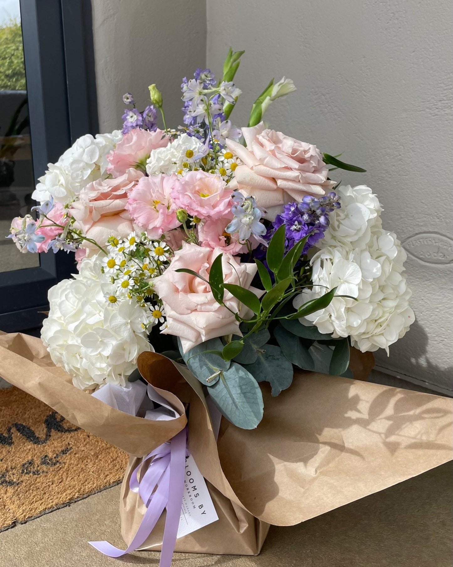 FRESH FLOWERS IN A WATER BOX