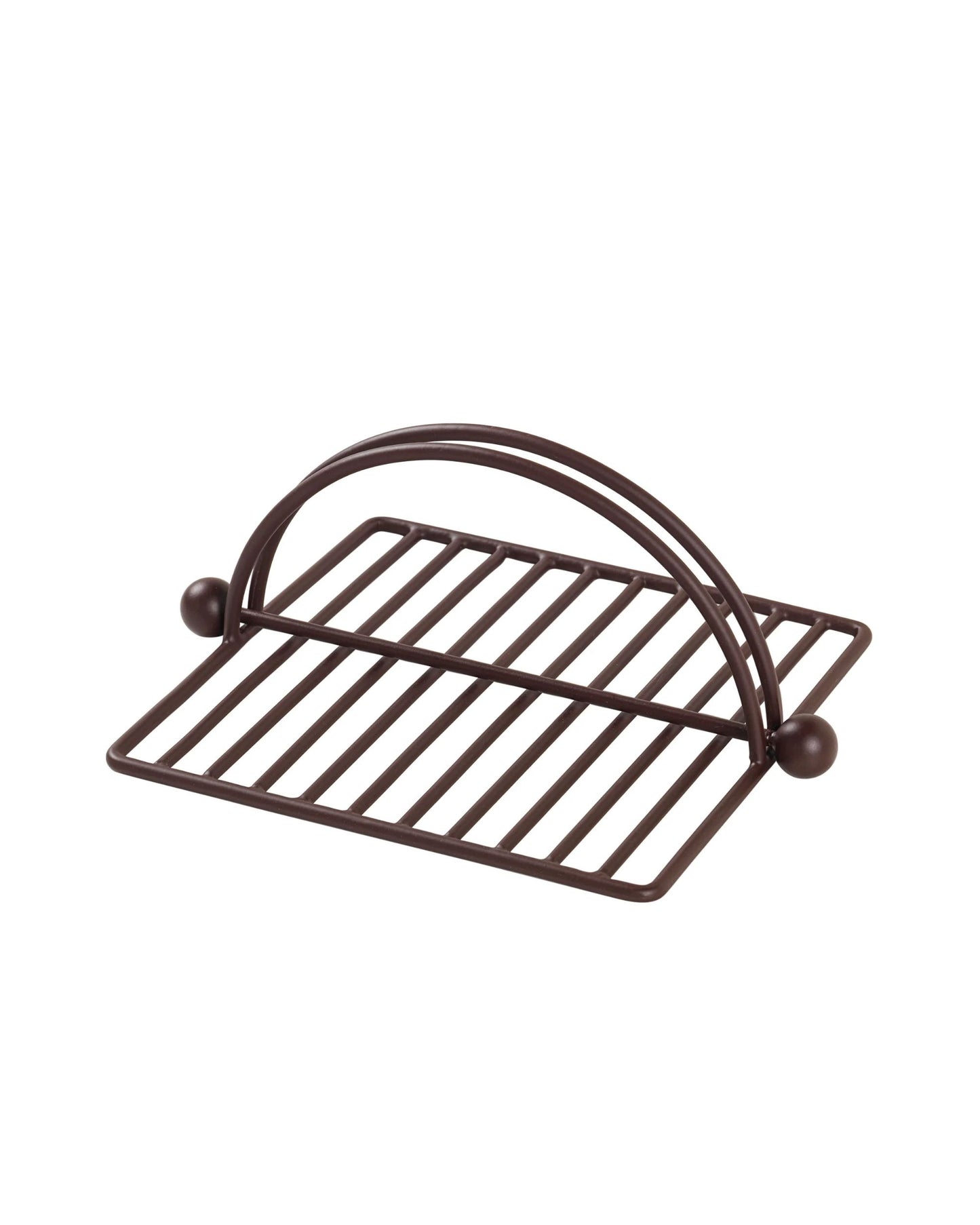 The Broste Napkin Holder Viet - Brown showcases a rectangular base complemented by an arched handle. Its design includes parallel bars on the bottom to keep napkins neatly organized. With its simple and modern aesthetic, this functional and decorative accessory is an ideal addition to any dining setting.