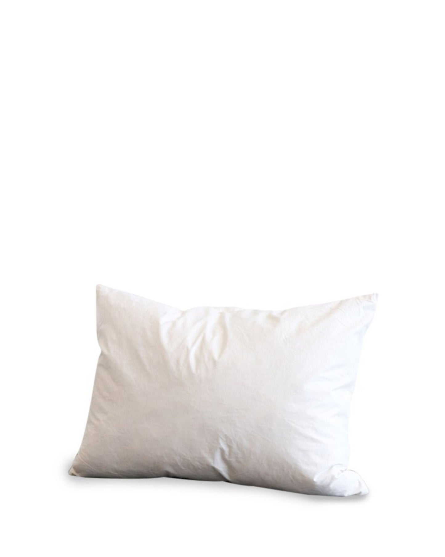 A plain white Hawthorne INNER 40x55 pillow on a white background, slightly crumpled to suggest softness and comfort, filled with 100% feather cushion inners.