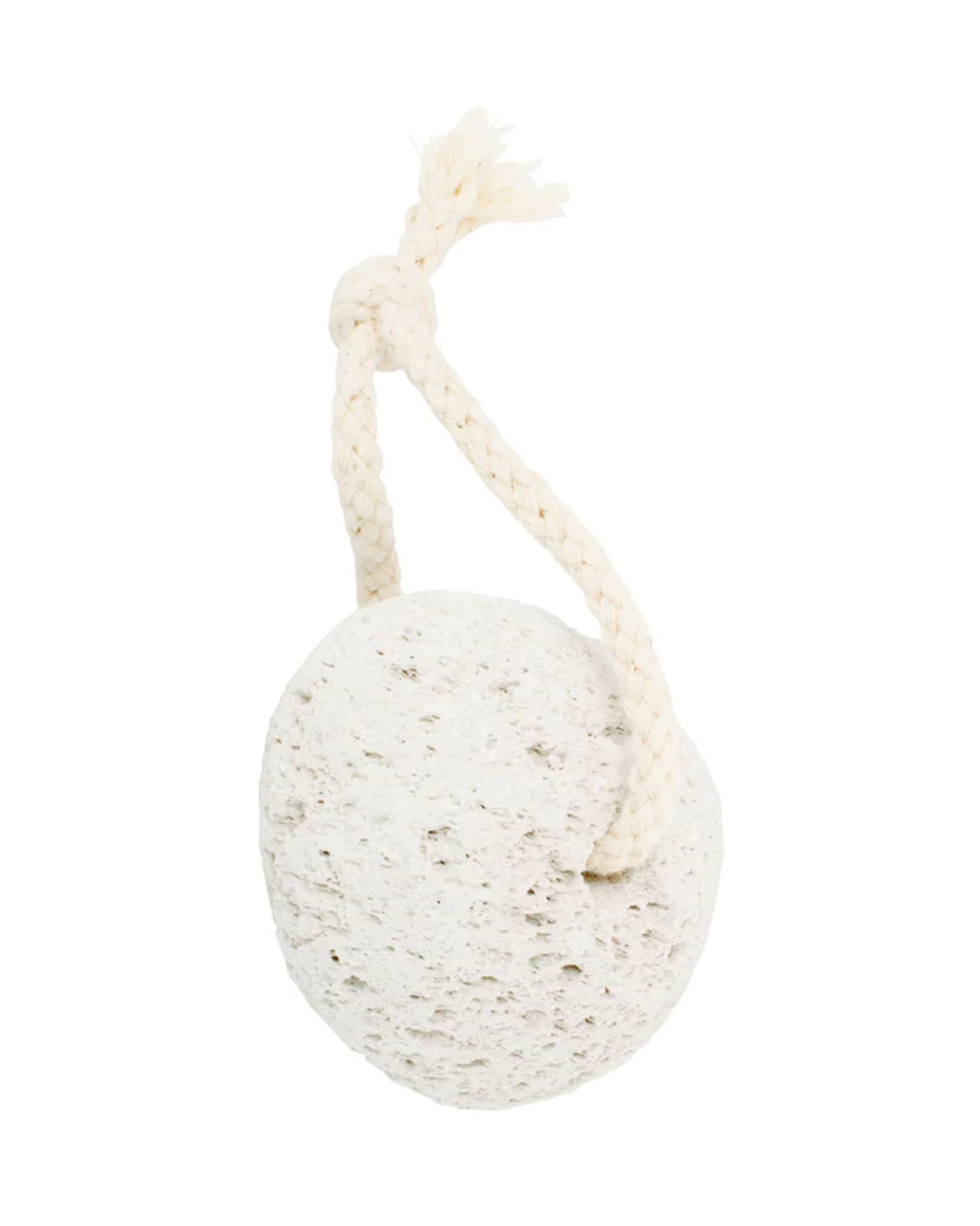 The HAMMAN PUMICE STONE by Redecker is a round, white pumice stone with a porous texture, ideal for removing dry skin and leaving your feet soft and smooth. It comes with a convenient braided rope loop for easy handling.