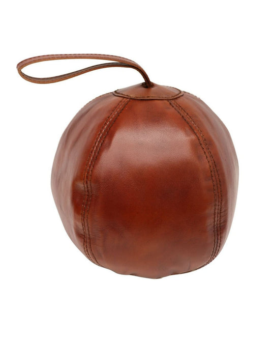 Introducing the CHANDRI LEATHER DOOR STOP by Hawthorne: a brown, genuine leather piece featuring visible stitching and a convenient loop handle on top. Its smooth, polished texture not only serves its practical function but also adds an elegant touch to any décor.