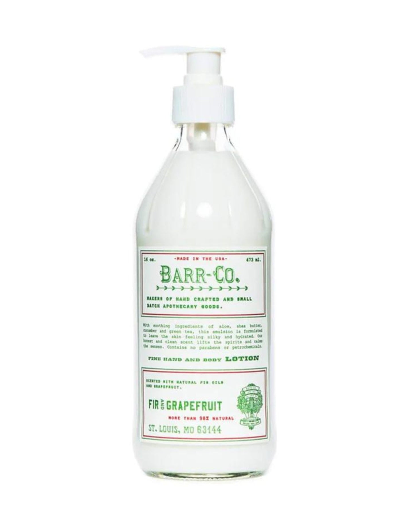 A clear bottle with a pump top holds BARR CO FINE SHEA BUTTER LOTION by Barr Co, featuring an infusion of natural plant extracts. The label indicates it is hand-crafted and made in the USA, with a vintage-style print design, offering 16 oz of lotion for superior moisture retention.