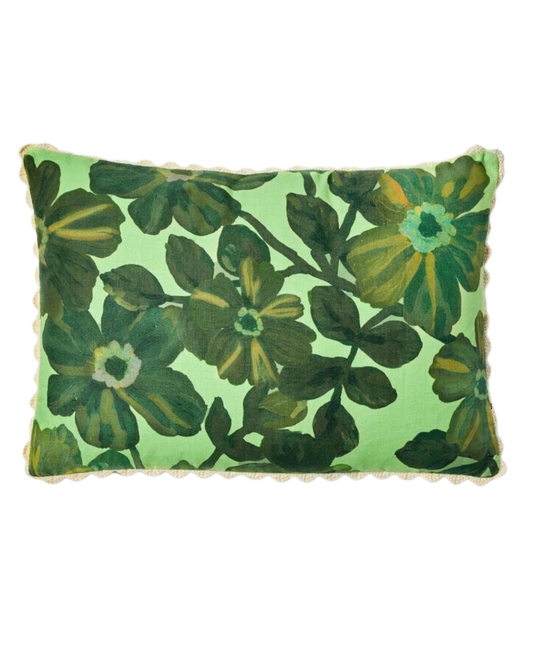 The ROSETTA DARK MINT 60CM X 40CM cushion by Bonnie and Neil is a delightful rectangular accent piece featuring a green background with vintage floral tapestries, highlighted by dark green leaves and flowers. It is elegantly finished with a scalloped cream trim, offering a timeless touch of beauty to any space.