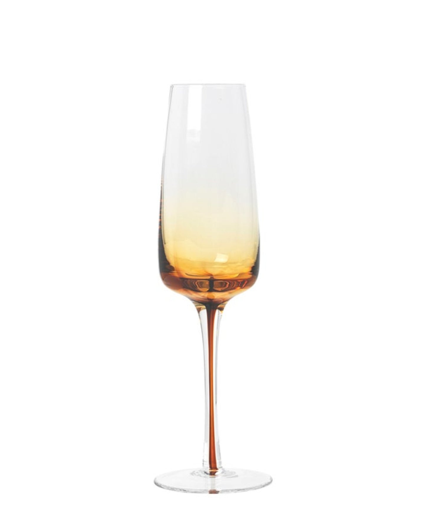 An exquisite CHAMPAGNE GLASS by Broste features a transparent design with a striking amber gradient at the base, its elegant curves accentuated against a plain white backdrop. With an elongated bowl and slender stem, this piece embodies timeless sophistication in every detail.