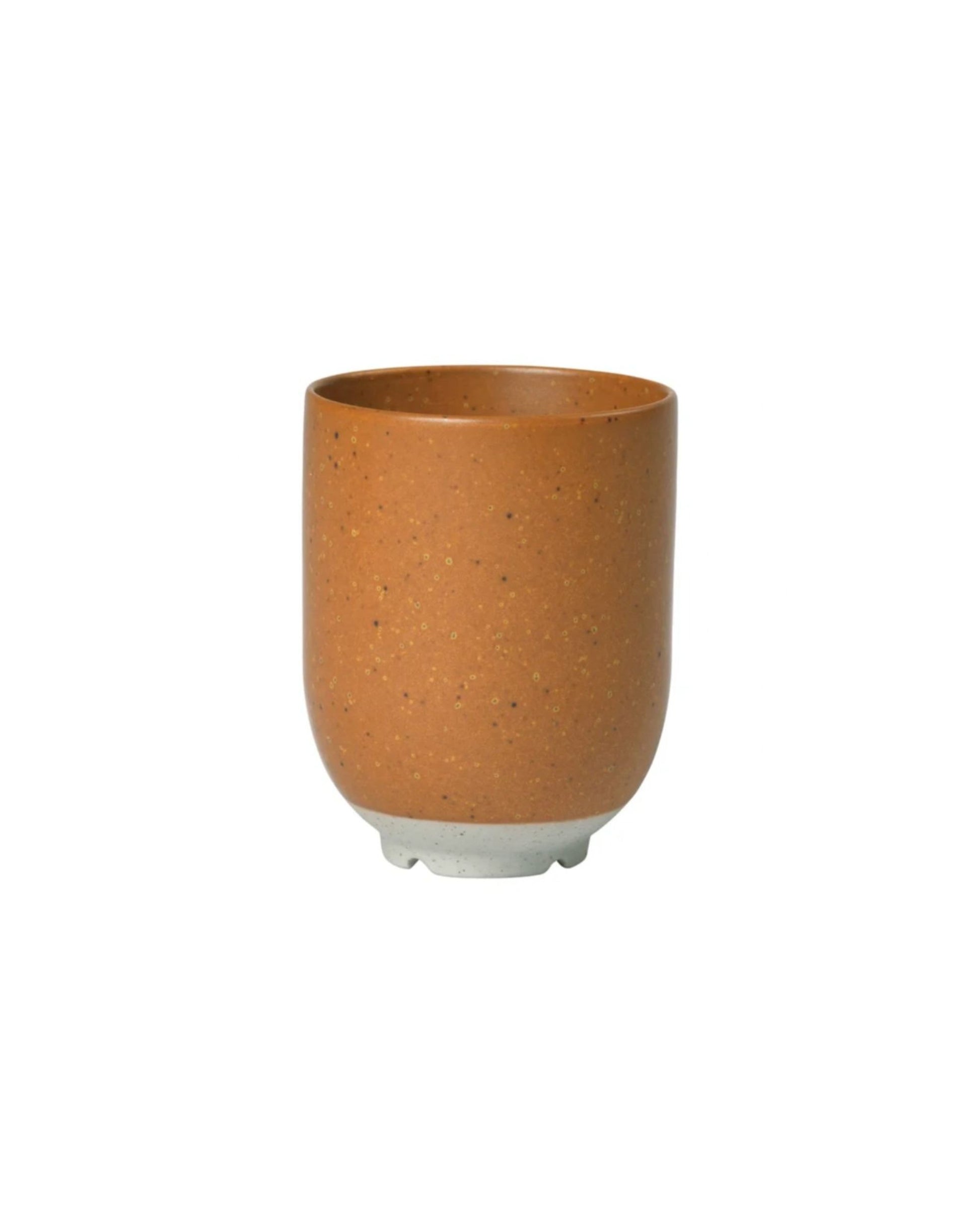 The ELI MUG NO HANDLE by Broste is a ceramic cup that showcases a modern Japanese design, with a brown speckled pattern, smooth finish, and slightly wider base set against a white background.