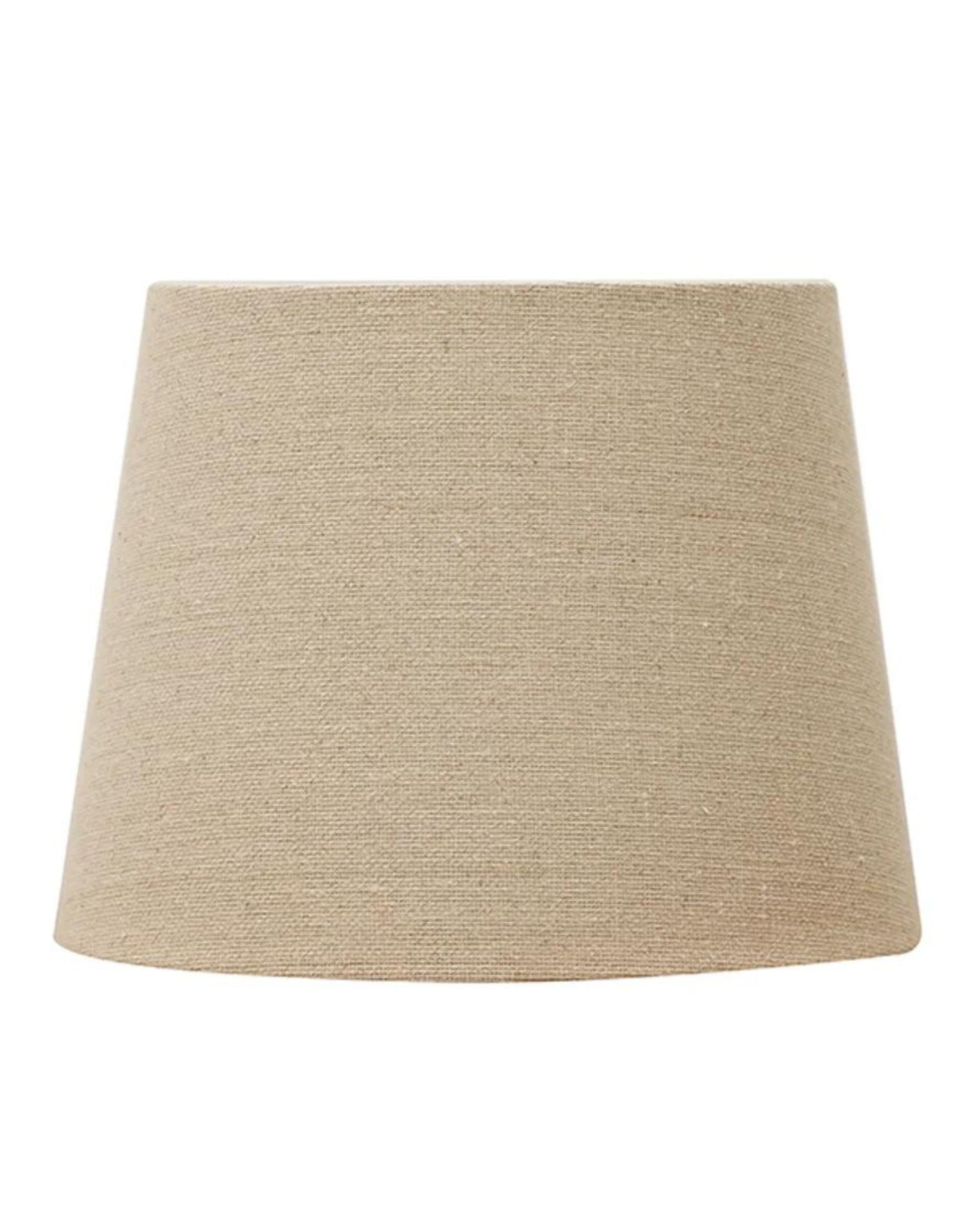 The FLAX BASKET WEAVE TALL DRUM 36CM SHADE by CC Interiors features a classic, simple design with a slightly wider bottom. Made from woven fabric in a beige hue, this lampshade is versatile and complements various interior styles.