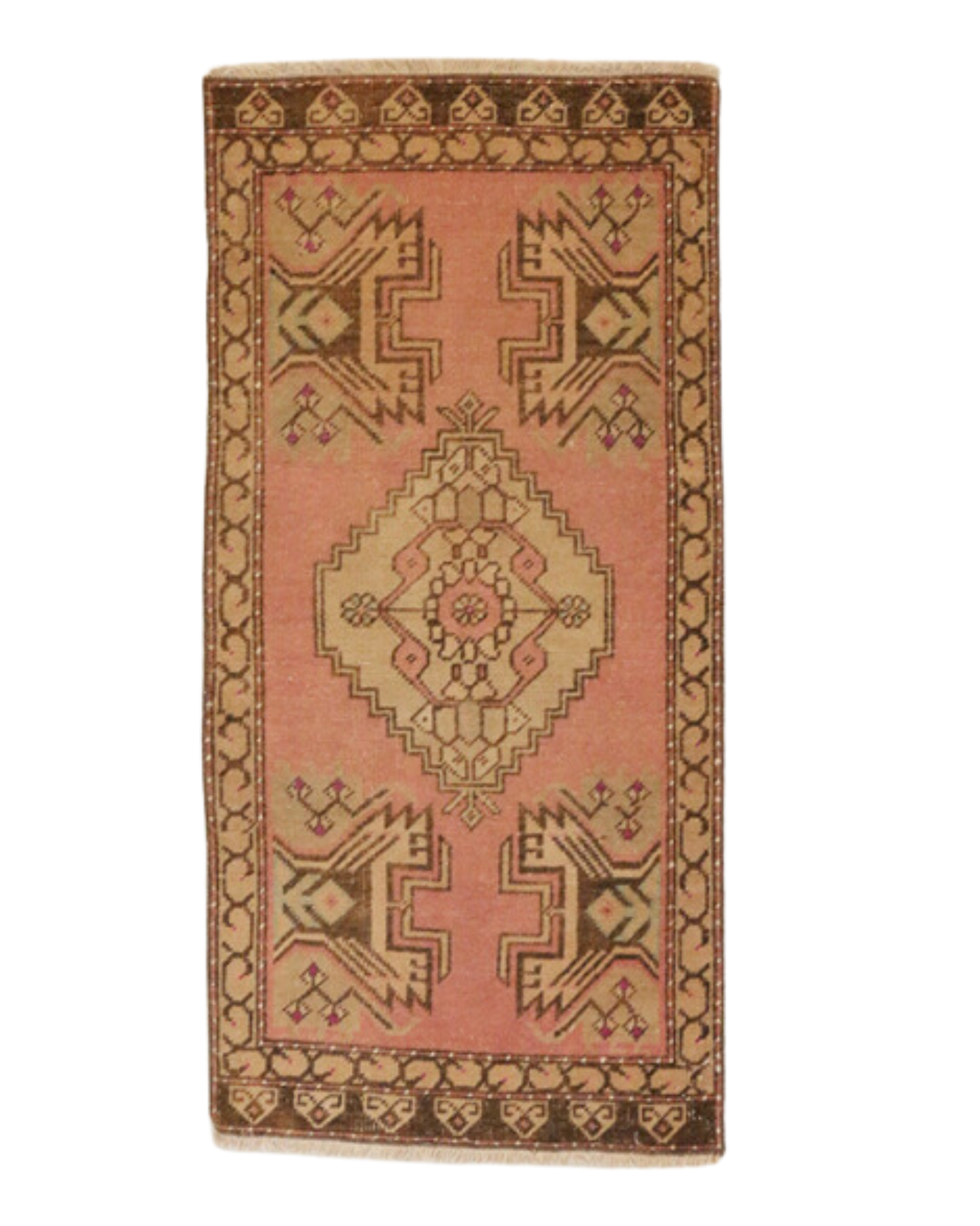 Introducing the HAND KNOTTED TURKISH ANATOLIAN VINTAGE RUG/MAT by CC interiors, measuring 112x52cm. This rectangular rug boasts a hand-knotted design featuring a geometric pattern in shades of pink, beige, and brown. Its intricate borders and symmetrical motifs highlight a central medallion, elegantly surrounded by stylized floral elements.