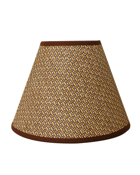 The IVORY LINSEED WEAVE 31CM SHADE by CC Interiors showcases a conical lampshade adorned with a rich brown geometric woven pattern on an ivory background, complemented by dark brown trim. Its expert craftsmanship infuses any room with elegance.