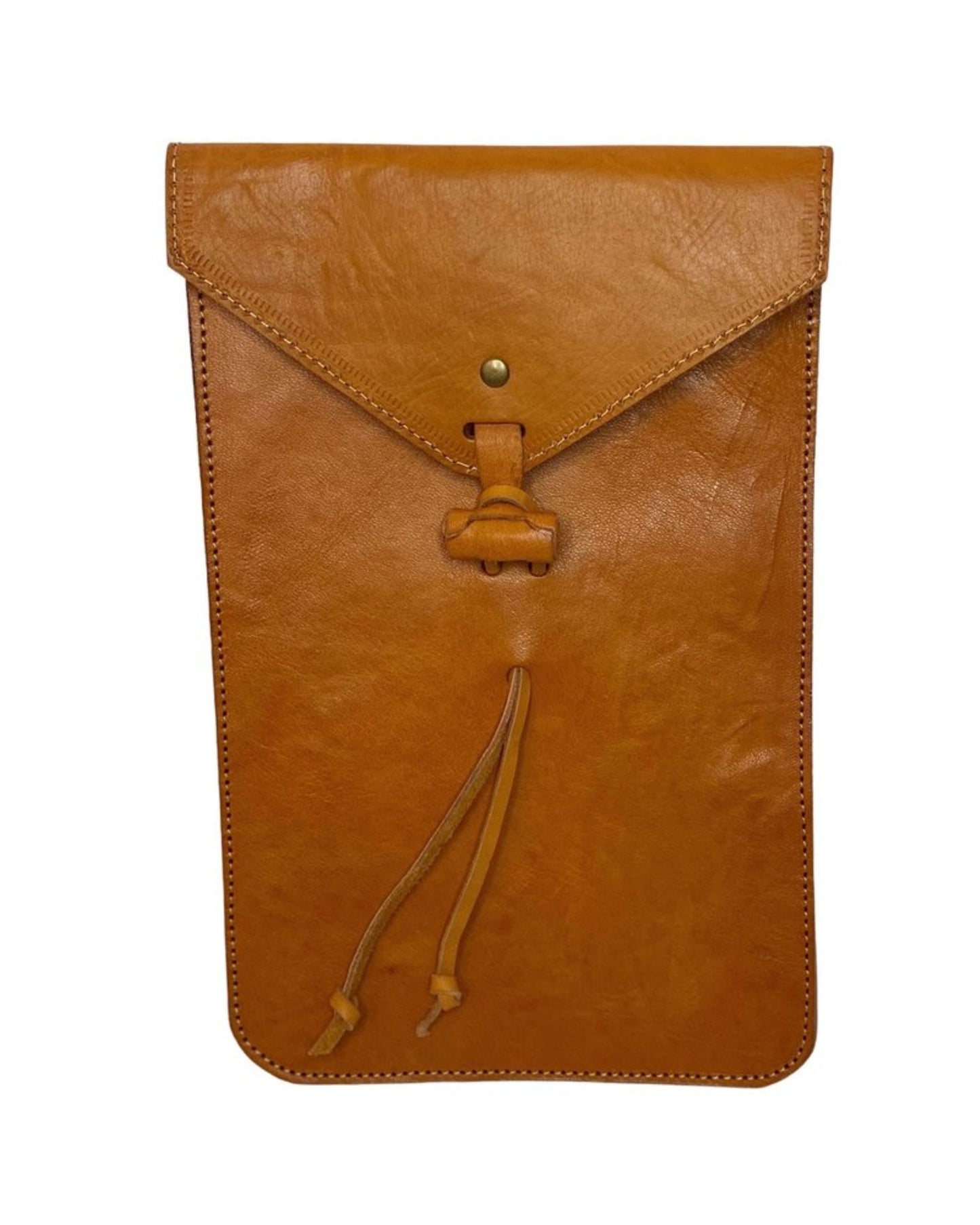 The Workroom's LEATHER KINDLE CASE is a premium, full-grain leather envelope-style pouch with a button-secured flap closure. Its design is accentuated by two elegant leather strings hanging from the center, making it not only stylish but also functional for those who desire a chic Kindle accessory.