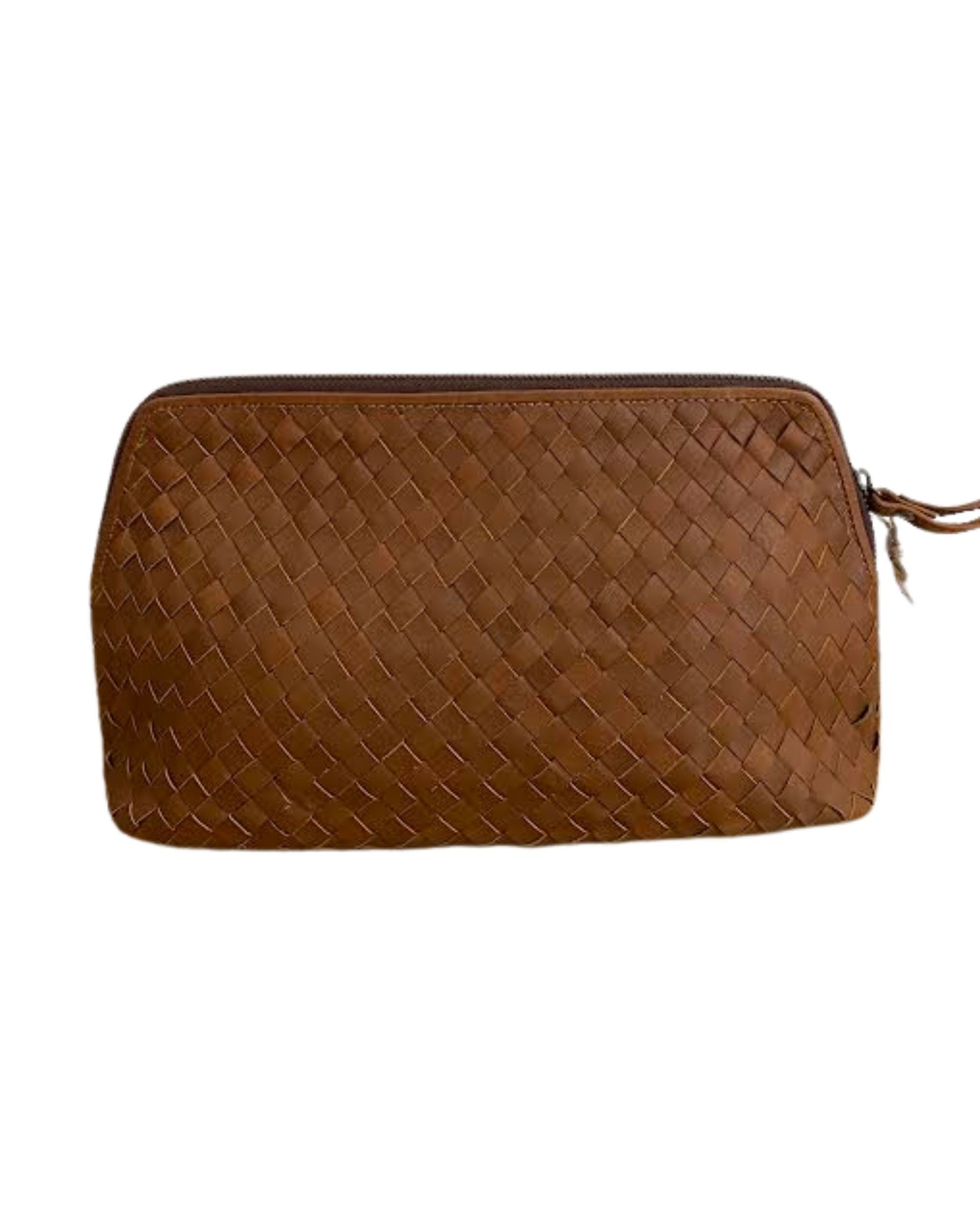 The LEATHER WOVEN WASH BAG by The Workroom highlights artisanal craftsmanship through its intricate brown basket weave pattern. Combining simplicity with elegance, it offers a functional design with a top zipper closure and a small zipper pull on the right side.