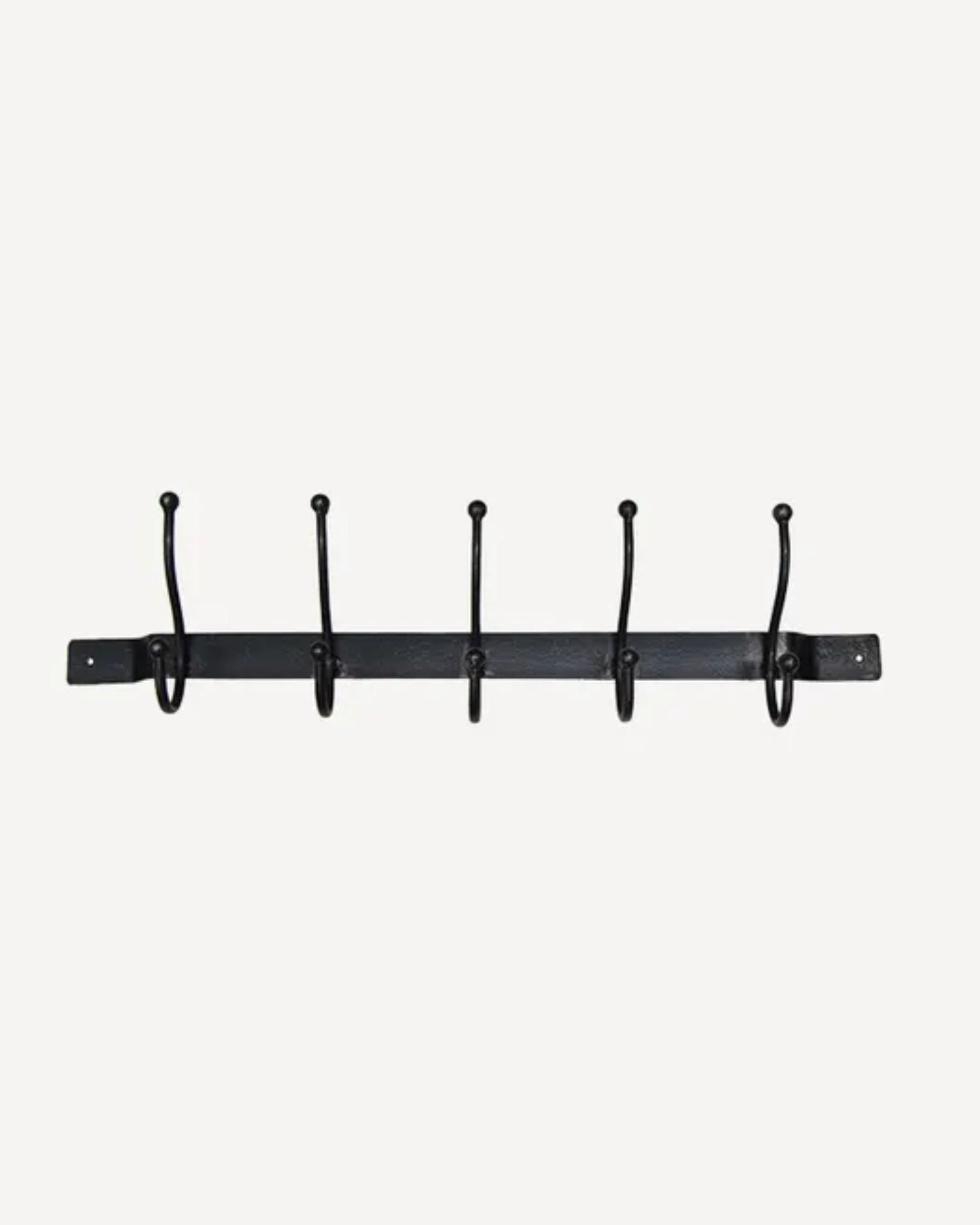 The OLD METAL 5 HOOK BAR by French Country is a black metal coat rack designed for indoor use, featuring five evenly spaced hooks on a rectangular base and coated with iron wax for a sleek finish against a plain white background.