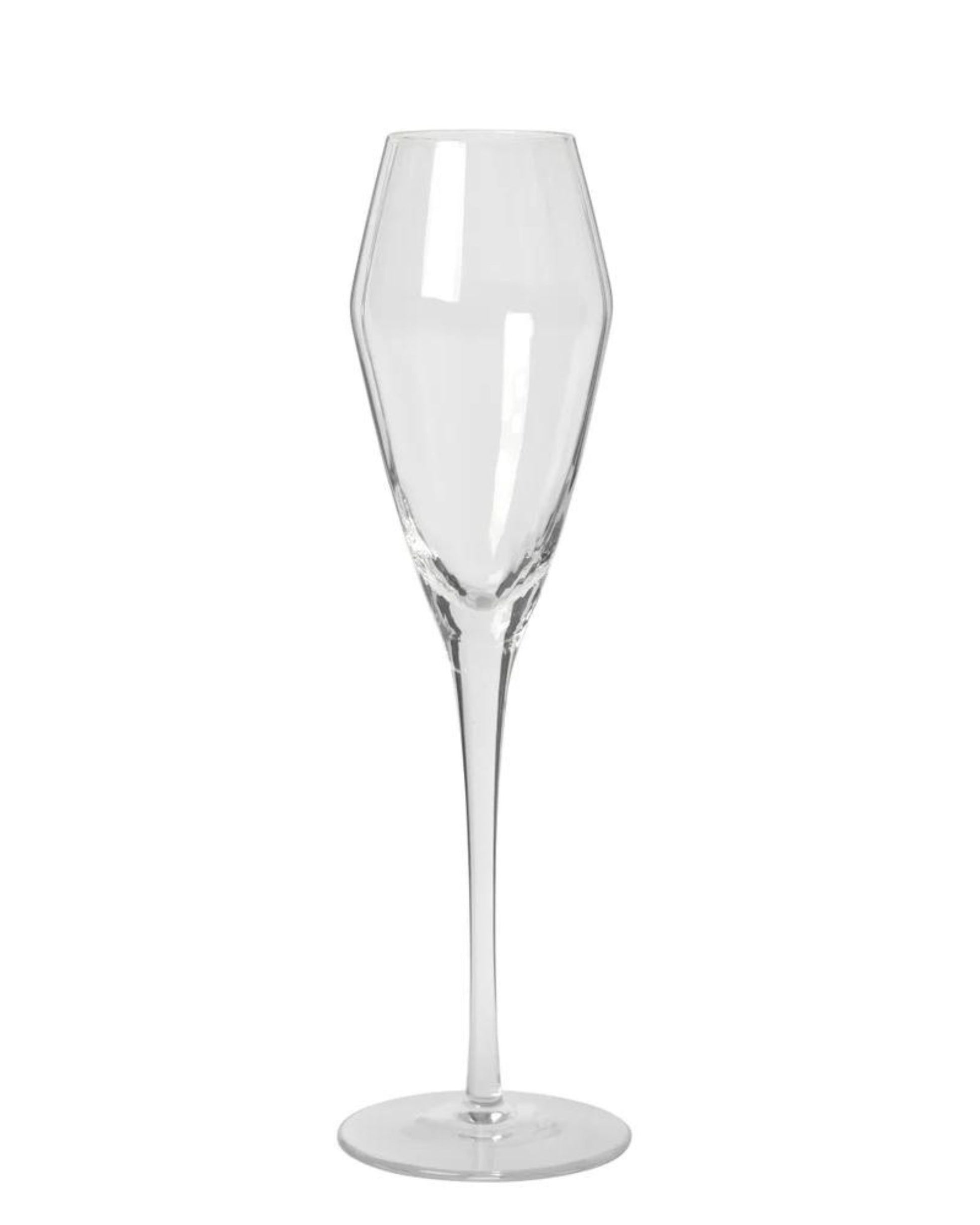 The SANDVIG CHAMPAGNE GLASS by Broste features a tall stem and a slightly angular bowl, showcasing Nordic design. Placed against a plain white background, it exudes coastal charm through its simple elegance.