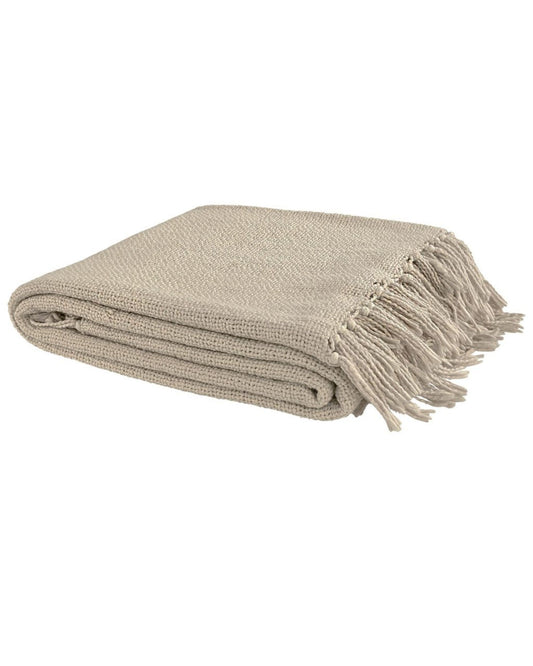 The SOLA LINEN THROW by Artwood is a folded beige woven linen throw with fringed edges, perfect for effortlessly enhancing your home decor.