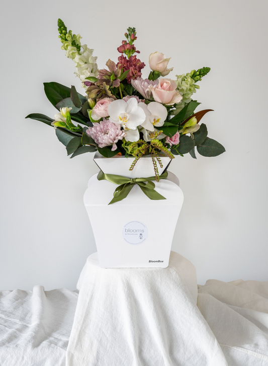 FRESH FLOWERS IN A WATER BOX